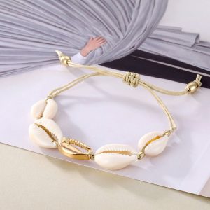 Bracelet de cheville coquillages Sirine – touche dorée