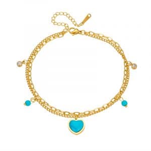 Un bracelet de cheville bijoux en plaqué or avec pendentif pierres turquoise Bleu et breloque cœur.