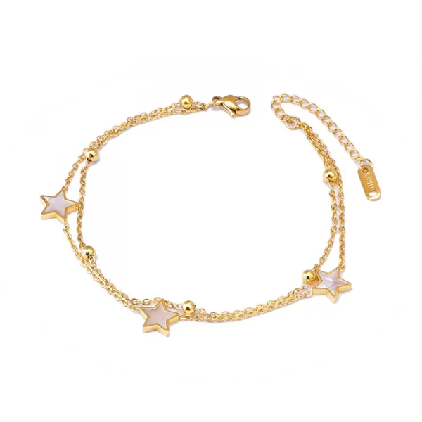 Description française: Le Bracelet de Cheville Étoile en Acier Inoxydable avec des perles blanches.