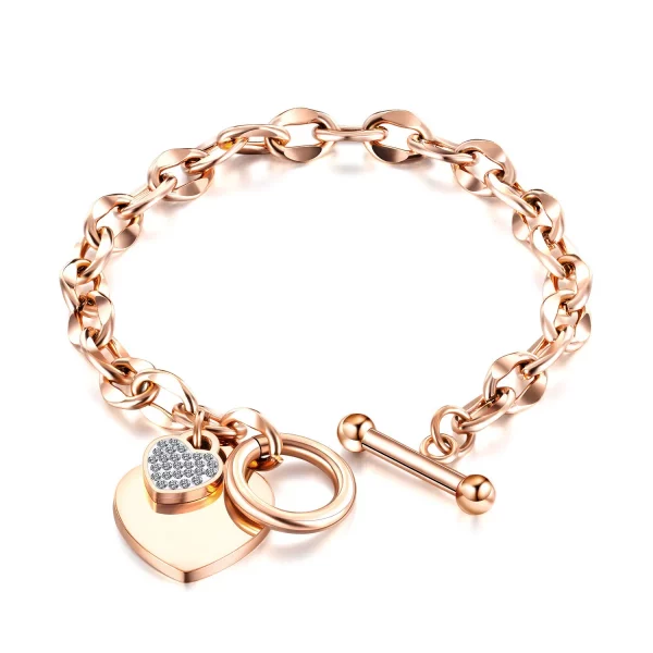 Un Bracelet acier inoxydable femme cœur chaîne maillon couleur rose gold avec un charm en forme de cœur.
