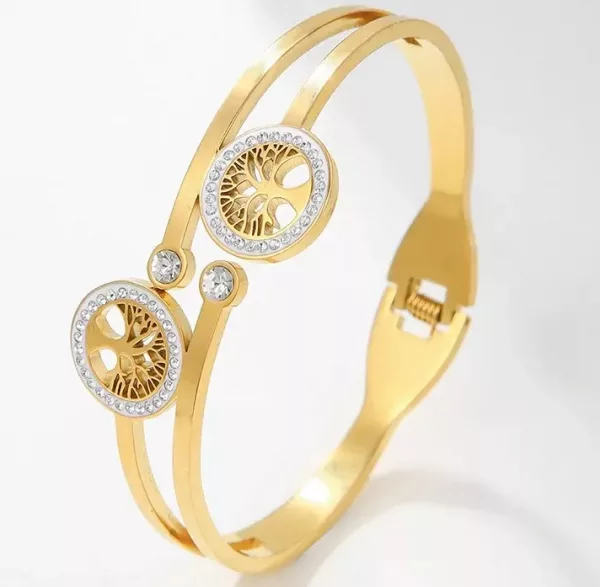 Un Jonc Arbre de Vie Double Doré avec deux diamants dessus.