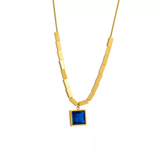 Un collier en acier avec une pierre bleue dessus.
