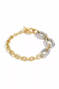 Bracelet NOLAN - chaîne contrastée acier inoxydable, composé de larges maillons alternant doré et argenté avec un fermoir toggle moderne.