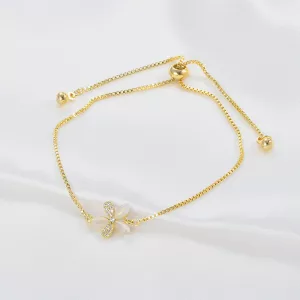 Bracelet fleur de nacre sur chaîne dorée ajustable en acier inoxydable