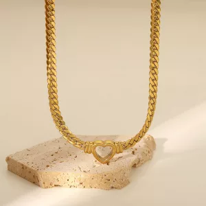 Collier cœur ajouré doré sur maille cubaine