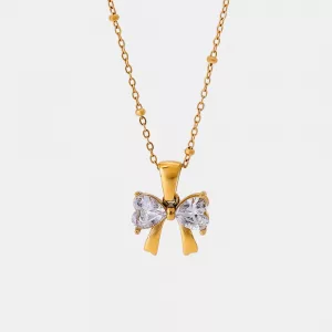 Collier pendentif nœud doré pavé de zircons