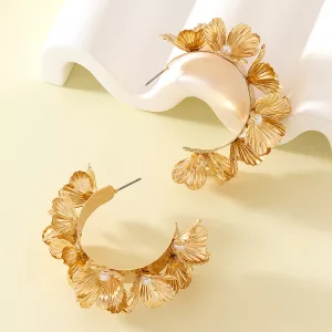 Boucles d'oreilles créoles fleur dorées en acier inoxydable