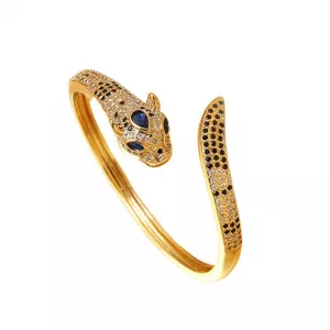 Bracelet léopard femme en cuivre doré serti de zircons bleus