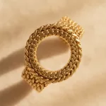 Bracelet maille dorée entrelacee en acier inoxydable