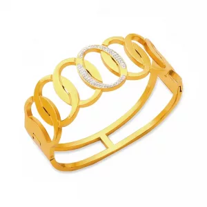 Bracelet manchette doré à ovales entrelacés et zircons