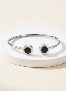 Jonc ouvert doré à cabochons de nacre et d’onyx